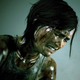 A The Last of Us Part 2 screenshot of protagonist Ellie crying in what could be viewed as a rainstorm.